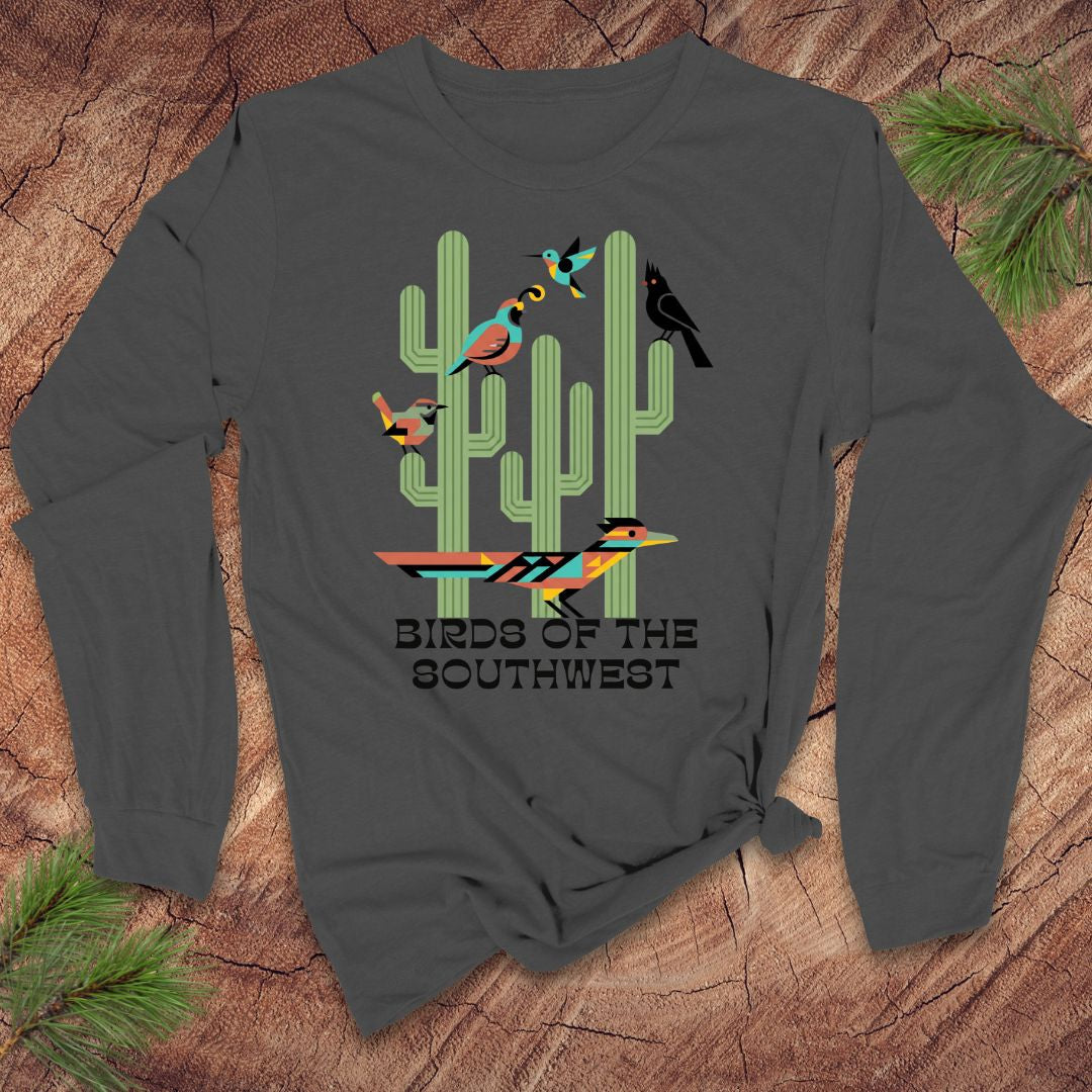 Gray long-sleeve tshirt with a graphic of cacti and birds on a wooden surface
