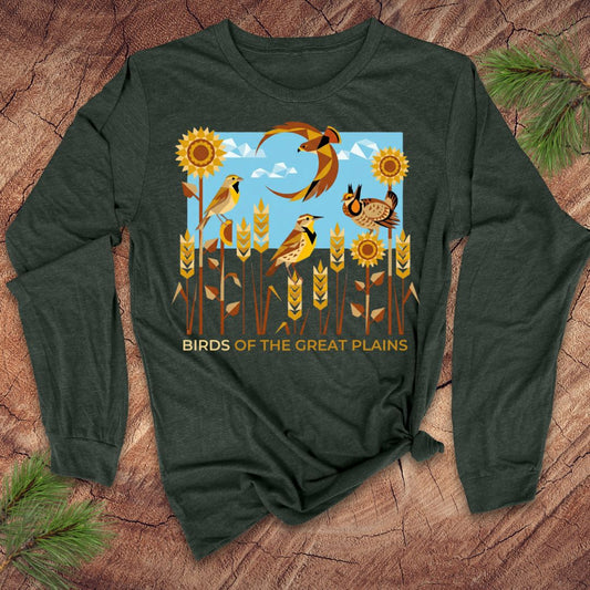 Green long-sleeve shirt with 'Birds of the Great Plains' design on a wooden surface.