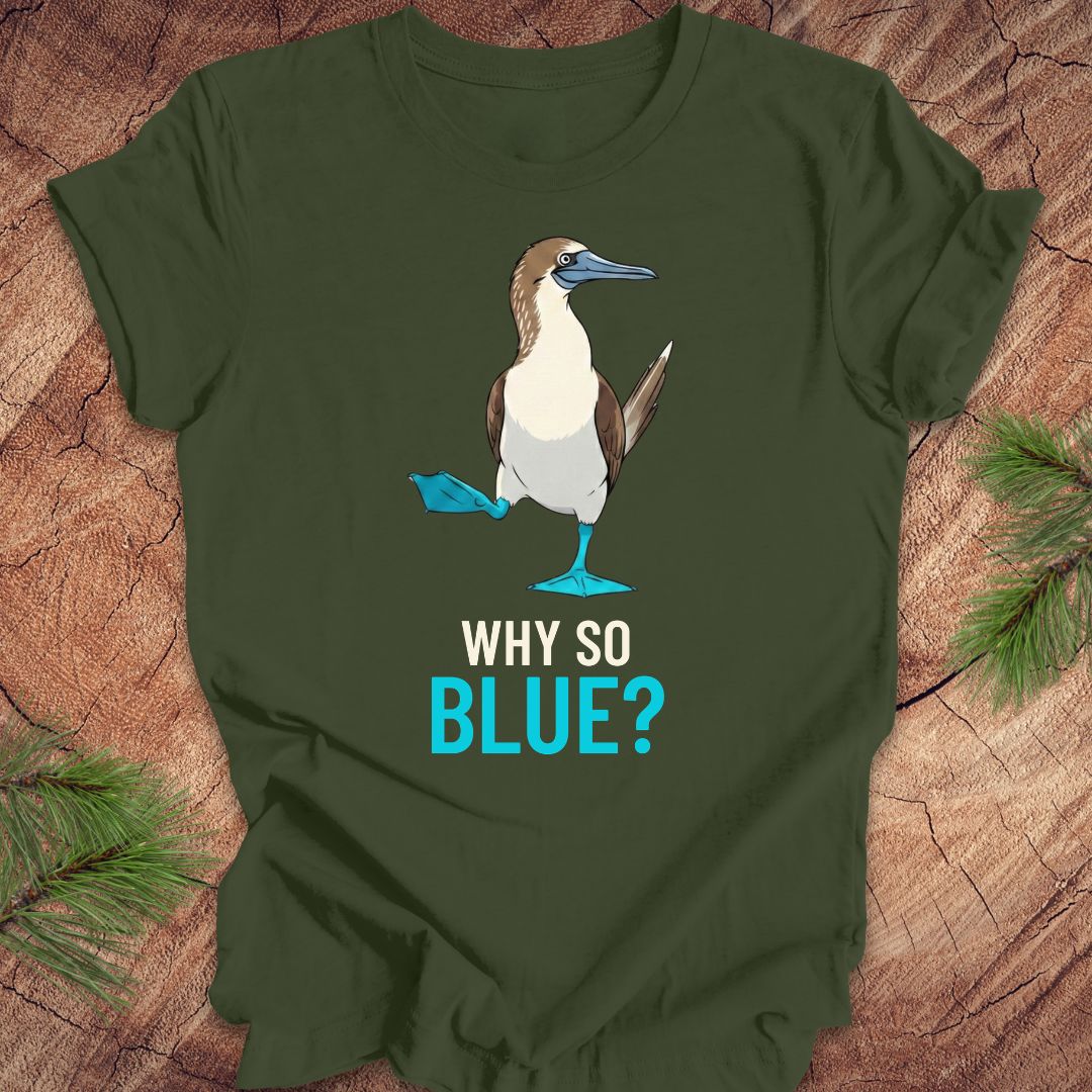 Green t-shirt with a blue booby graphic and 'Why So Blue?' text on a wooden surface.