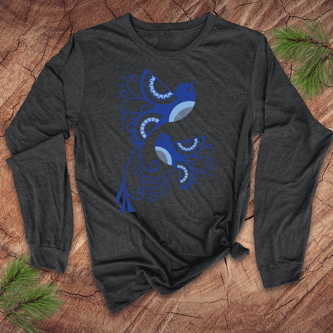 Dark gray long-sleeve shirt with blue abstract bird design on a wooden surface
