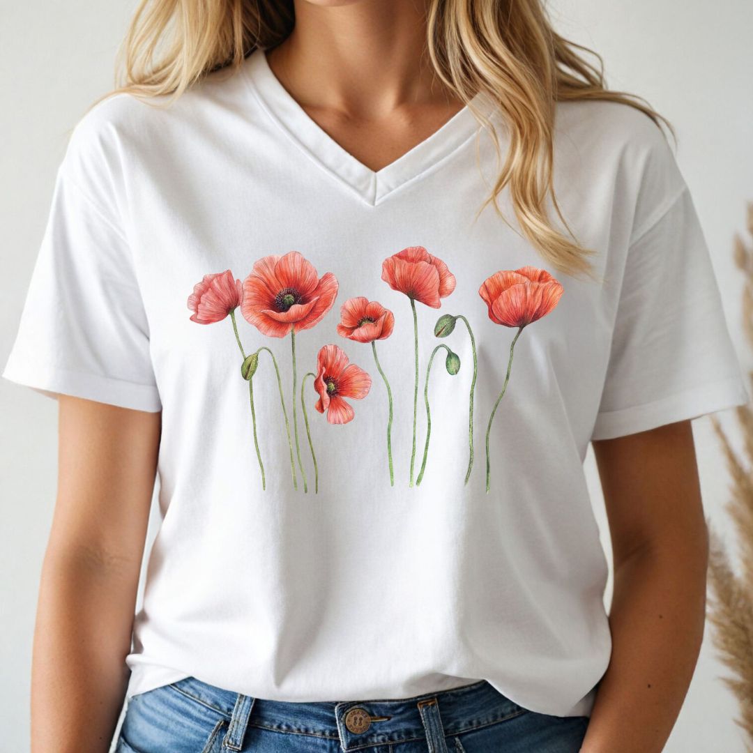 White v-neck t-shirt with red floral poppy design worn by a person