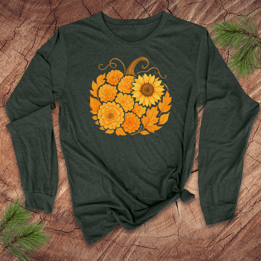 Green long-sleeve shirt with a pumpkin design featuring sunflowers on a wooden surface.