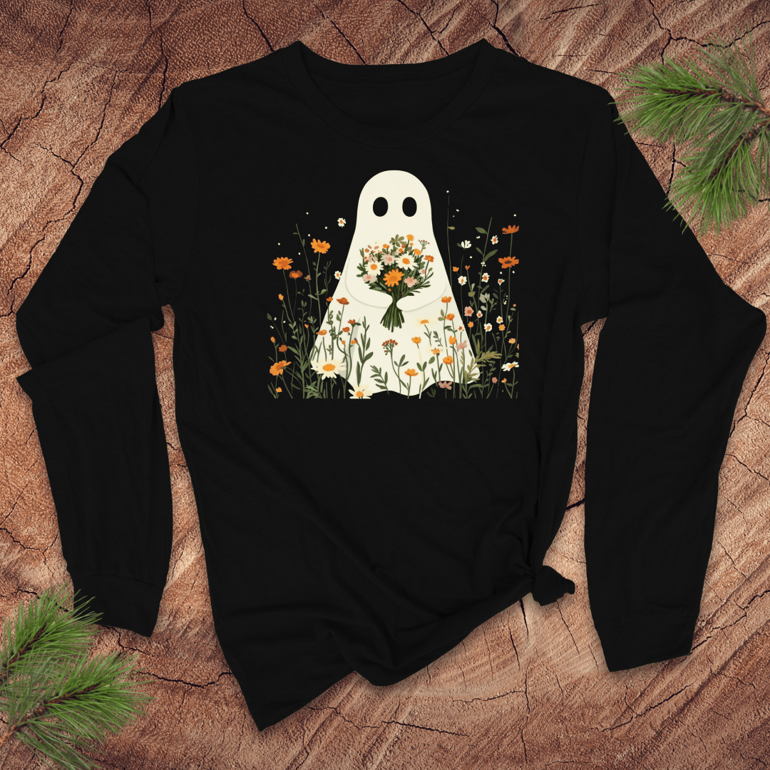 Black long-sleeve shirt with a ghost holding a bouquet of flowers design on a wooden surface.