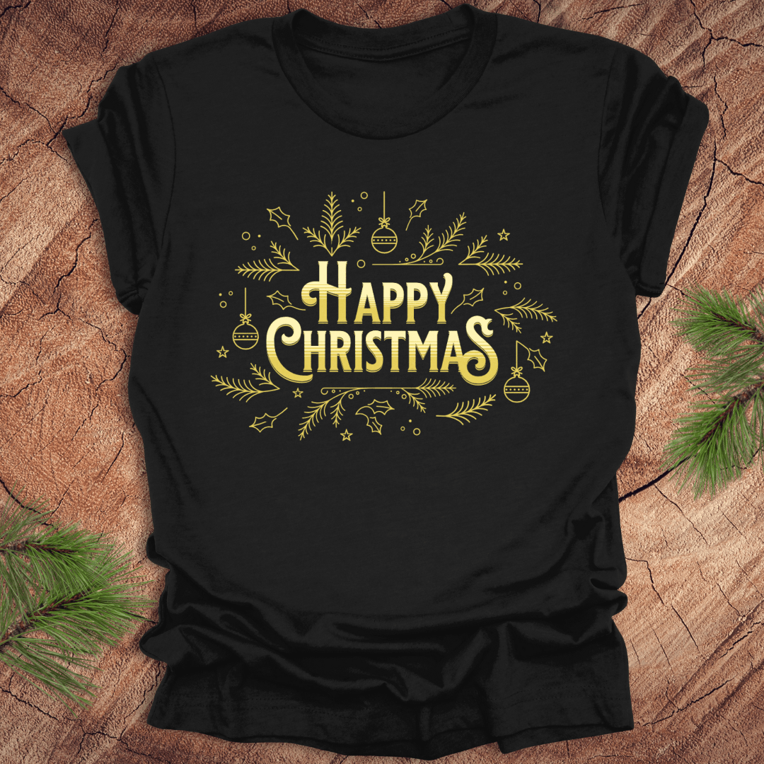 Black t-shirt with 'Happy Christmas' text and pine graphics on a wooden surface with pine branches.