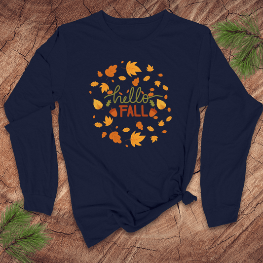 navy long sleeve tshirt with 'hello FALL' and leaf design on a wooden surface