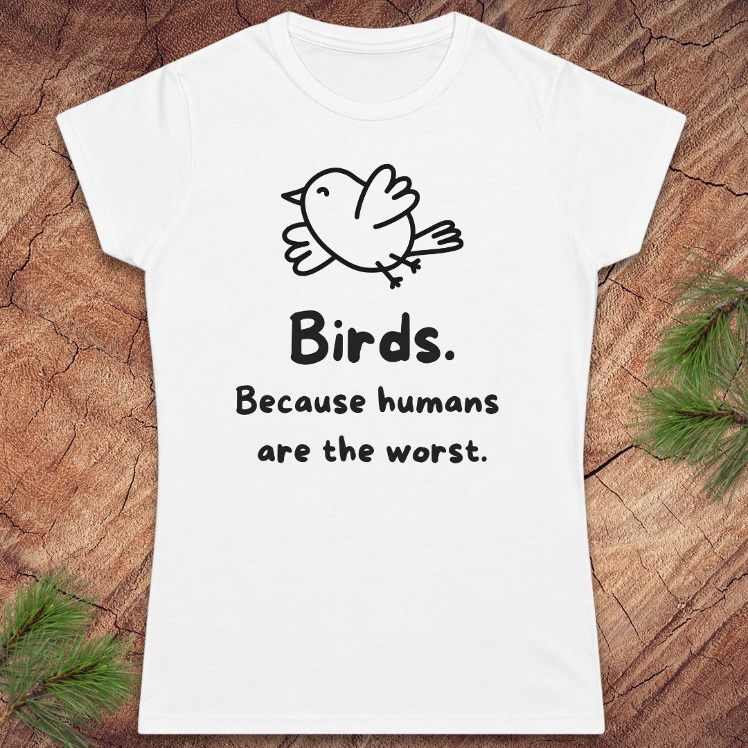 A white short-sleeve t-shirt with a white line-art bird and the text 'Birds. Because humans are the worst.