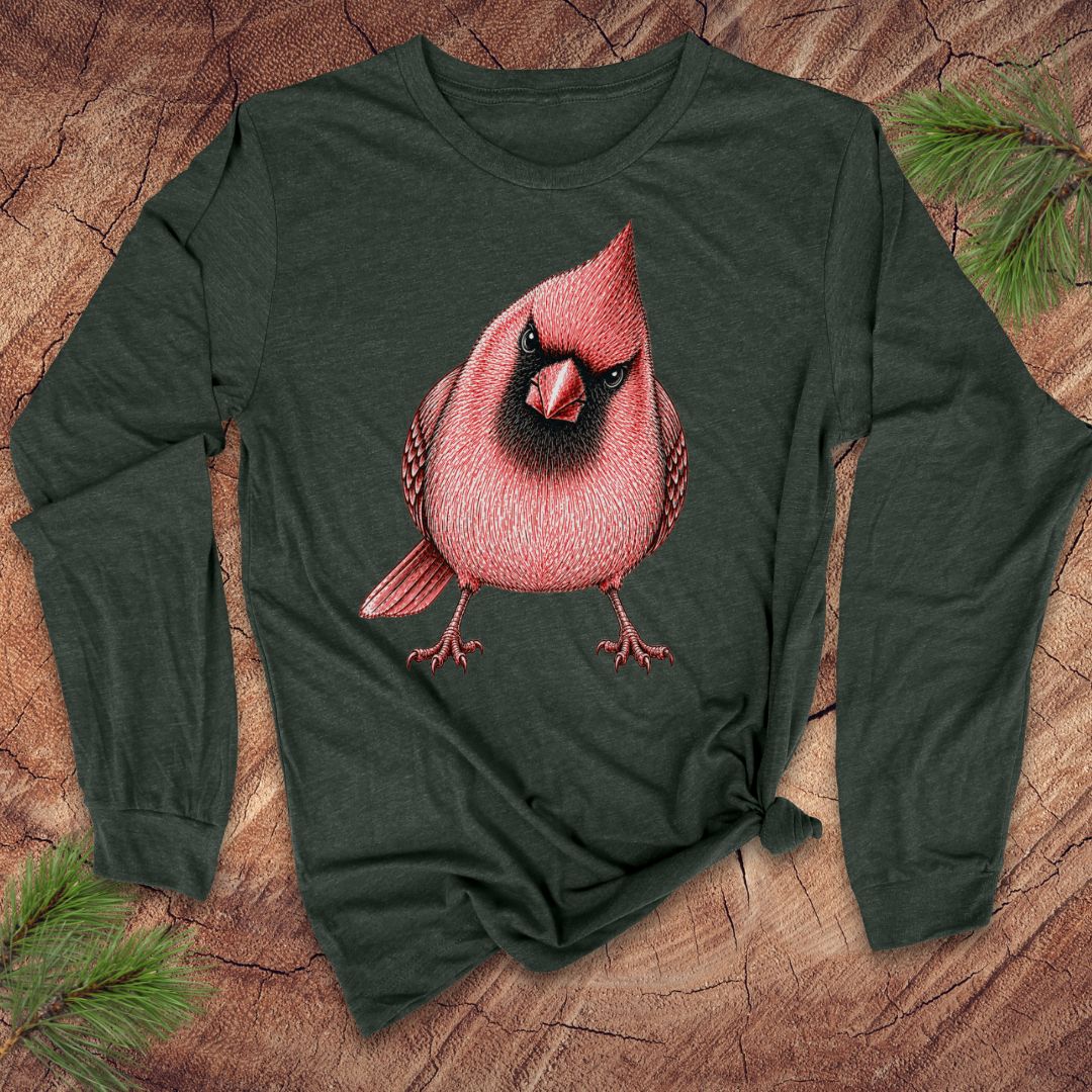 Green long-sleeve shirt with a red cardinal bird design on a wooden surface.