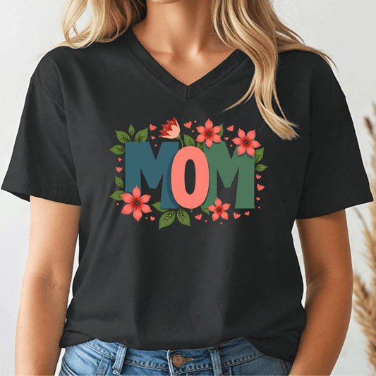 Black t-shirt with 'MOM' and floral design worn by a person