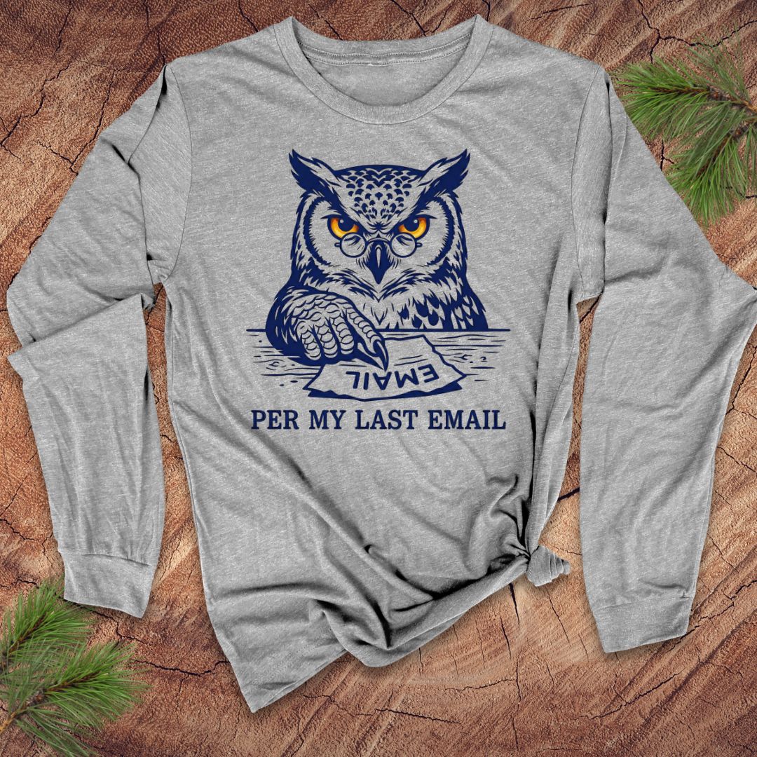 Gray long-sleeve shirt with an owl graphic and text, 'per my last email' on a wooden surface