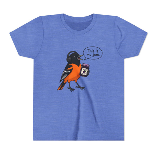 A heather blue short-sleeve t-shirt featuring a cartoon graphic of an oriole bird holding a jar of peanut butter with a speech bubble that says 'This is my jam.'.