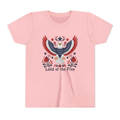 Pink t-shirt with an eagle graphic and 'Land of the Free' text on a white background