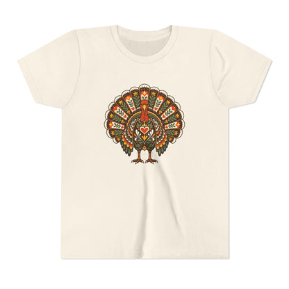 An off-white short-sleeve t-shirt with a central graphic of a stylized, patterned turkey in earthy tones of orange, green, and brown, displayed on a clean white background.