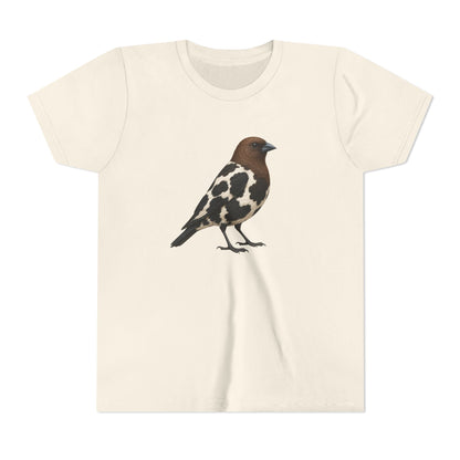 A beige short-sleeve crewneck t-shirt featuring a graphic print of a bird with a brown head and black-and-white spotted body, displayed against a solid white background.
