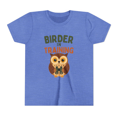 Blue t-shirt with an owl graphic and text 'Birder in Training' on a white background