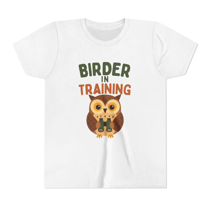 White t-shirt with an owl graphic and 'Birder in Training' text on a white background