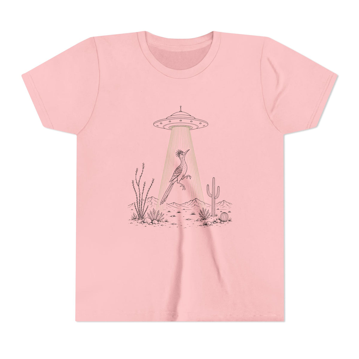 A light pink short-sleeve crewneck t-shirt featuring a graphic print of a desert scene with a bird under a UFO and a beam of light.