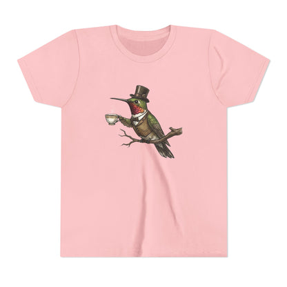 Pink t-shirt with a cartoon hummingbird wearing a top hat and holding a cup on a white background