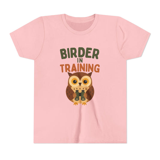 Pink t-shirt with an owl graphic and text 'Birder in Training' on a white background