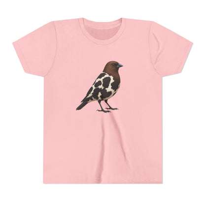 A light pink short-sleeve crewneck t-shirt featuring a graphic illustration of a bird with brown, black, and white plumage on the center chest, displayed against a solid white background.