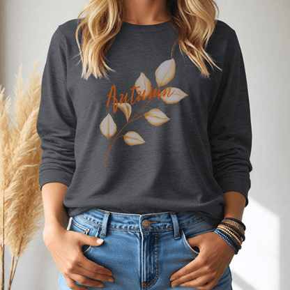woman wearing a grey long sleeve tshirt with the word autumn and a long stemmed leaf with a white background