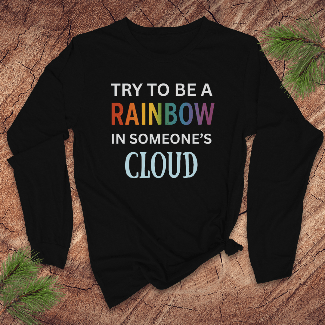 Black long sleeve tshirt with colorful inspirational text on a textured surface