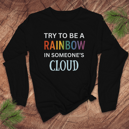 Black long sleeve tshirt with colorful inspirational text on a textured surface