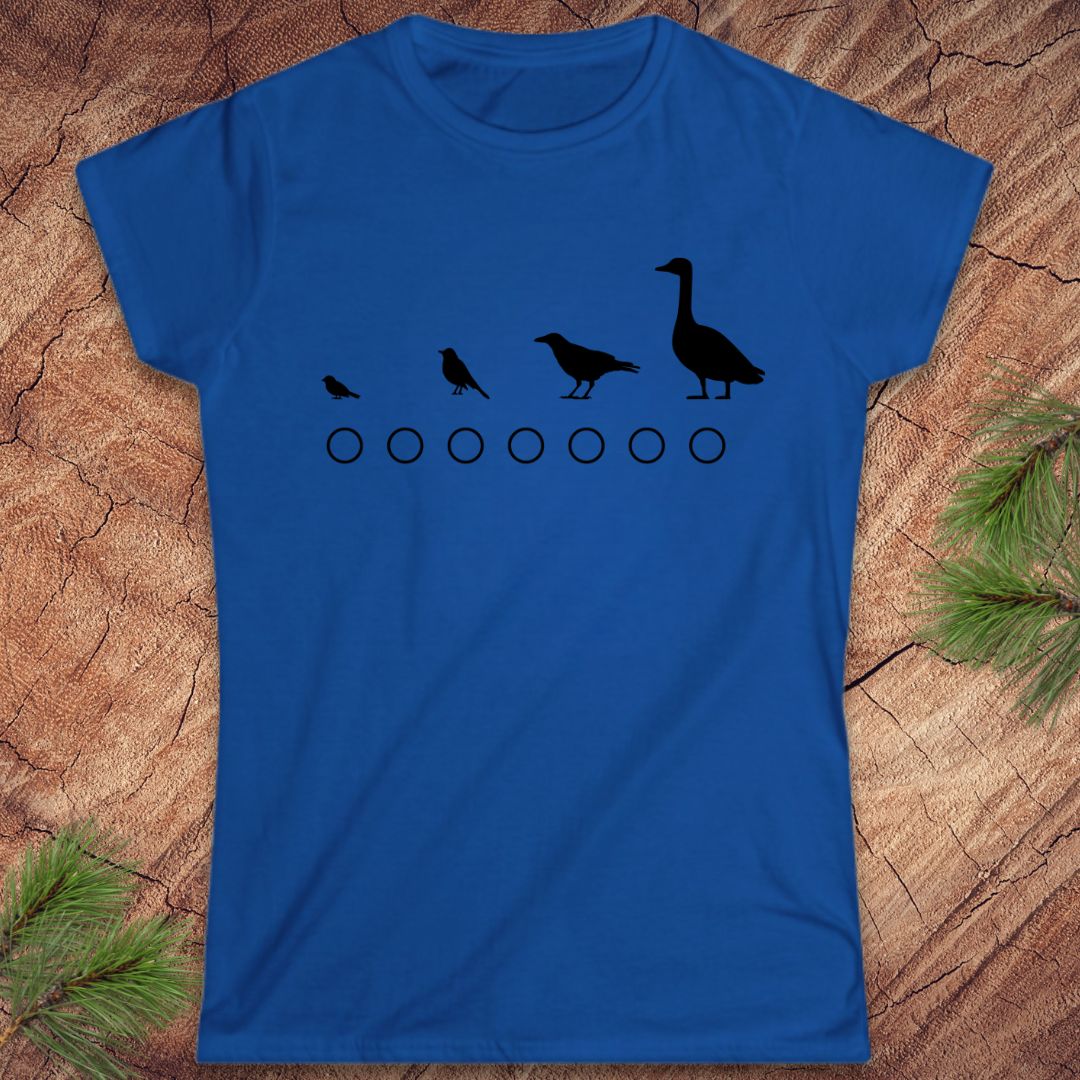 Blue t-shirt with black bird design on a wooden surface