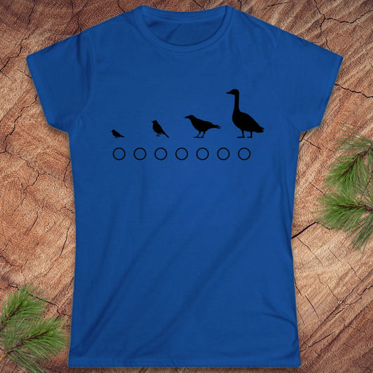 Blue t-shirt with black bird design on a wooden surface