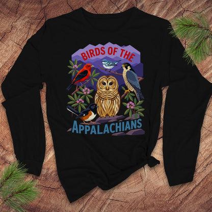 Black long-sleeve tshirt with birds and mountains and text, 'birds of the appalachians' on a wood background