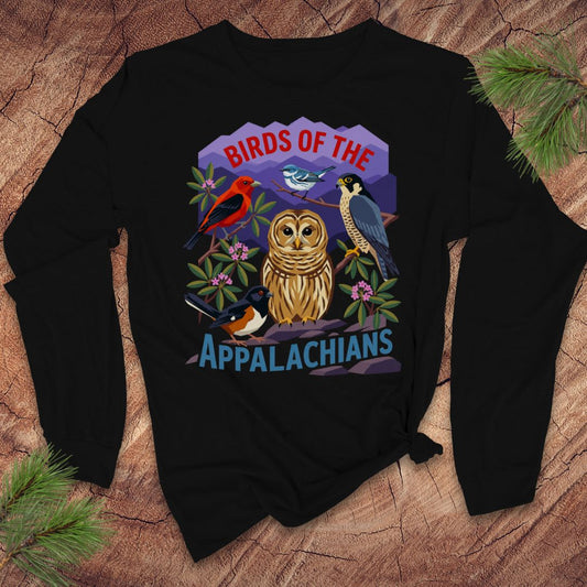 Black long-sleeve tshirt with birds and mountains and text, 'birds of the appalachians' on a wood background