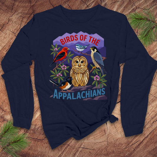 Navy blue long-sleeve tshirt with birds and mountains and text, 'birds of the appalachians' on a wood background