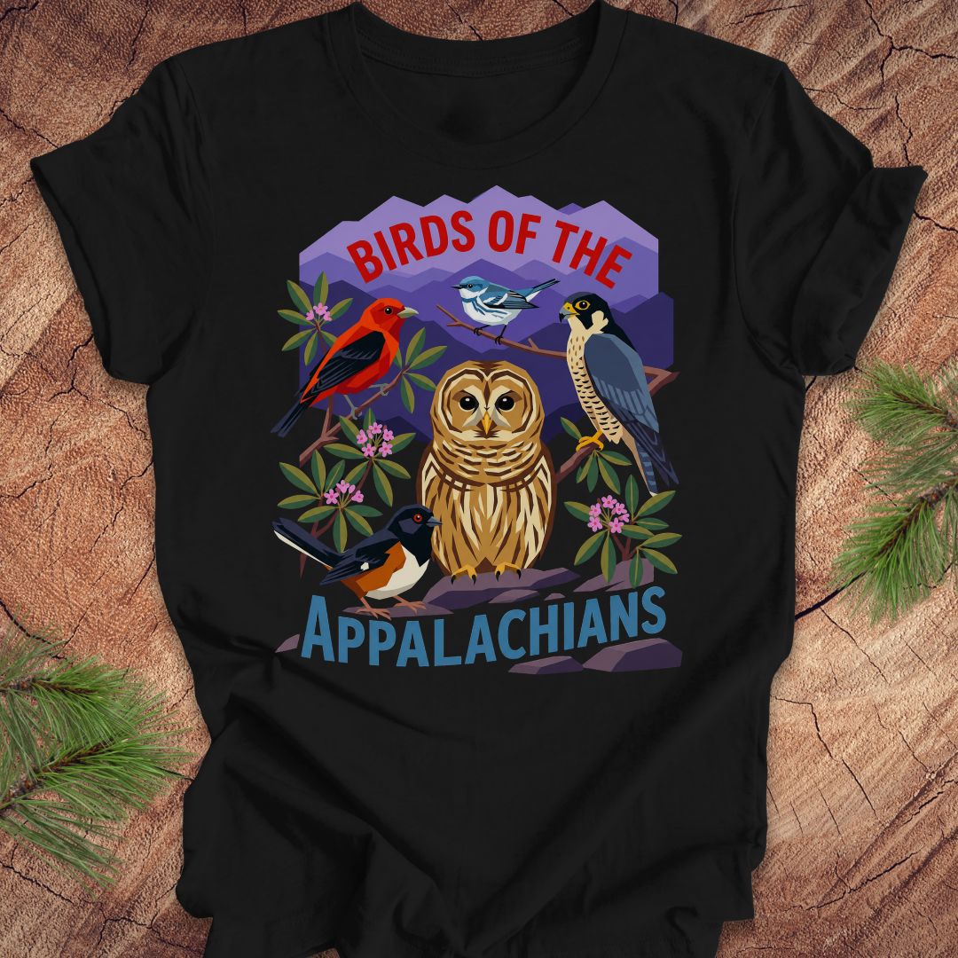 Black t-shirt with 5 birds and text, 'birds of the appalachians' on a wood background. 