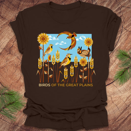 Brown t-shirt with 'Birds of the Great Plains' design featuring birds and sunflowers on a wooden surface.