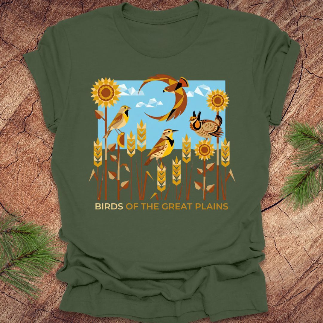 Green t-shirt with 'Birds of the Great Plains' design featuring birds, sunflowers, and a moon on a wooden background.