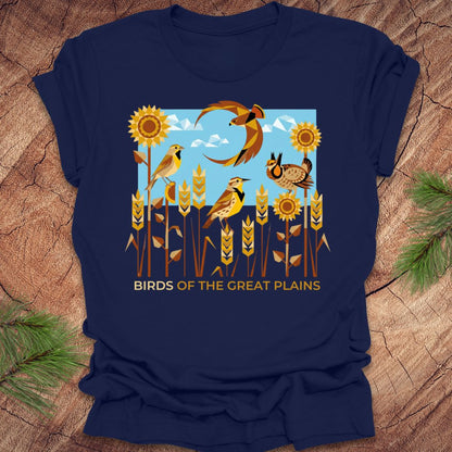 Navy blue t-shirt with 'Birds of the Great Plains' design featuring birds, sunflowers, and a moon on a wooden surface.