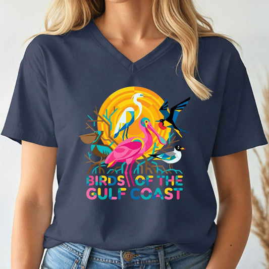 Navy blue t-shirt with colorful 'Birds of the Gulf Coast' design worn by a person.