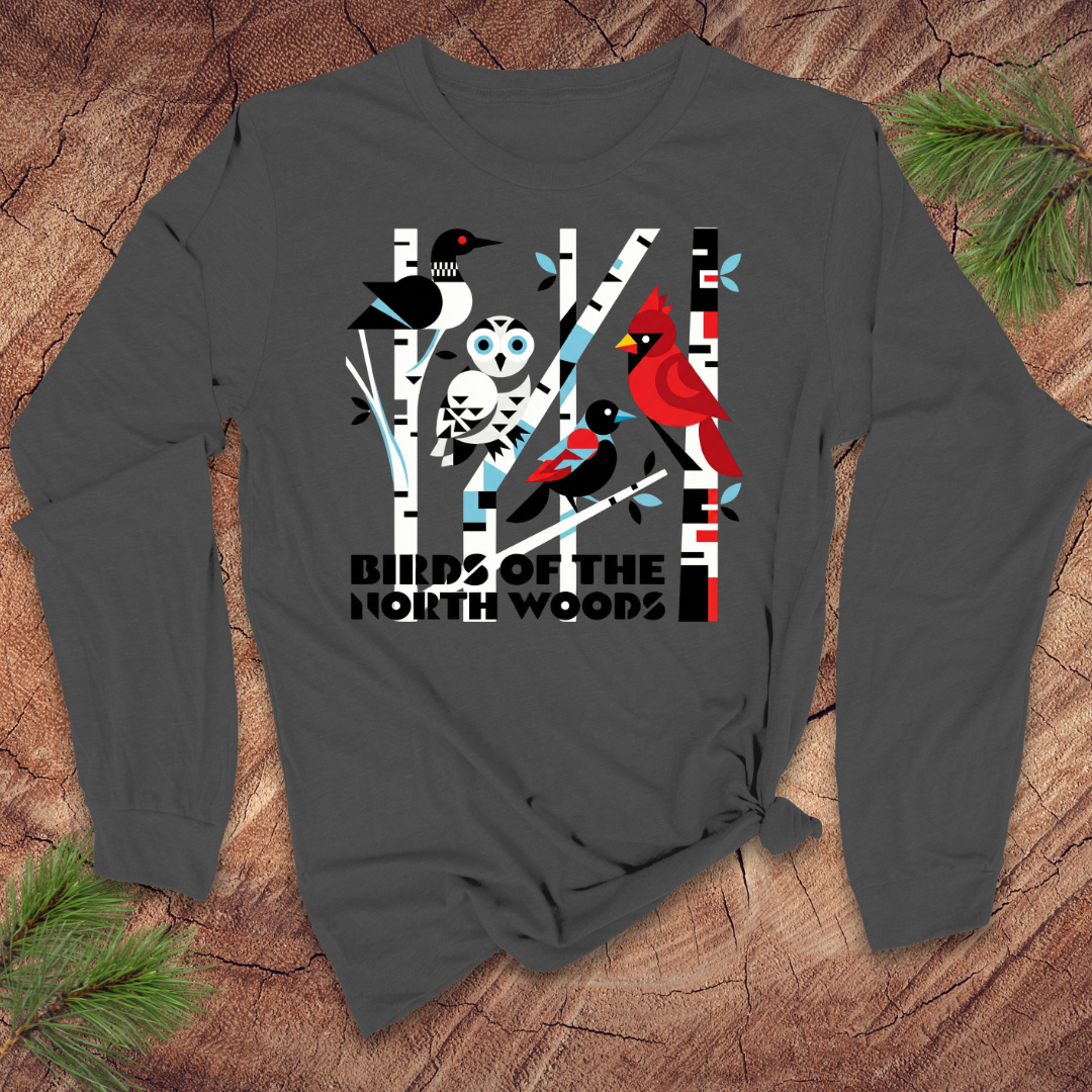 Dark gray long-sleeve shirt with bird design on a wooden surface