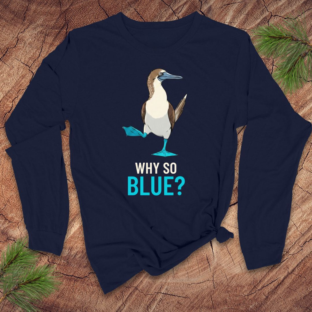 Navy blue long-sleeve shirt with a blue-footed booby bird graphic and 'Why So Blue?' text on a wooden surface.