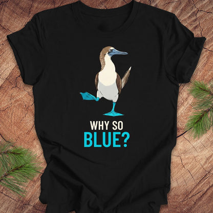 Black t-shirt with a blue booby graphic and 'Why So Blue?' text on a wooden surface.