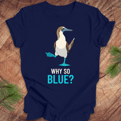 Navy blue t-shirt with a blue booby graphic and 'Why So Blue?' text on a wooden surface.