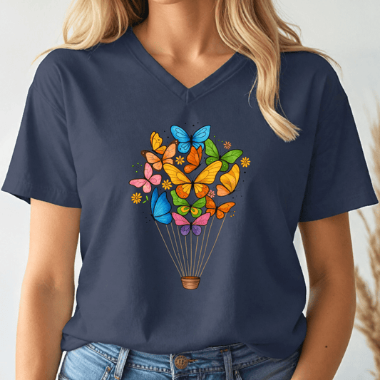 Navy blue t-shirt with colorful butterfly design worn by a person