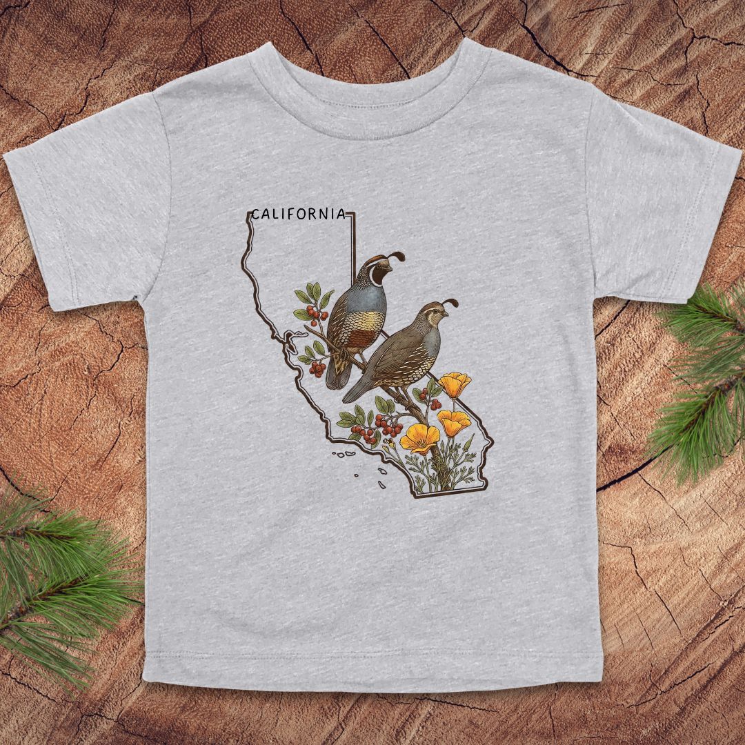 Gray toddler t-shirt with state outline of California and quails and flowers on a wood background.