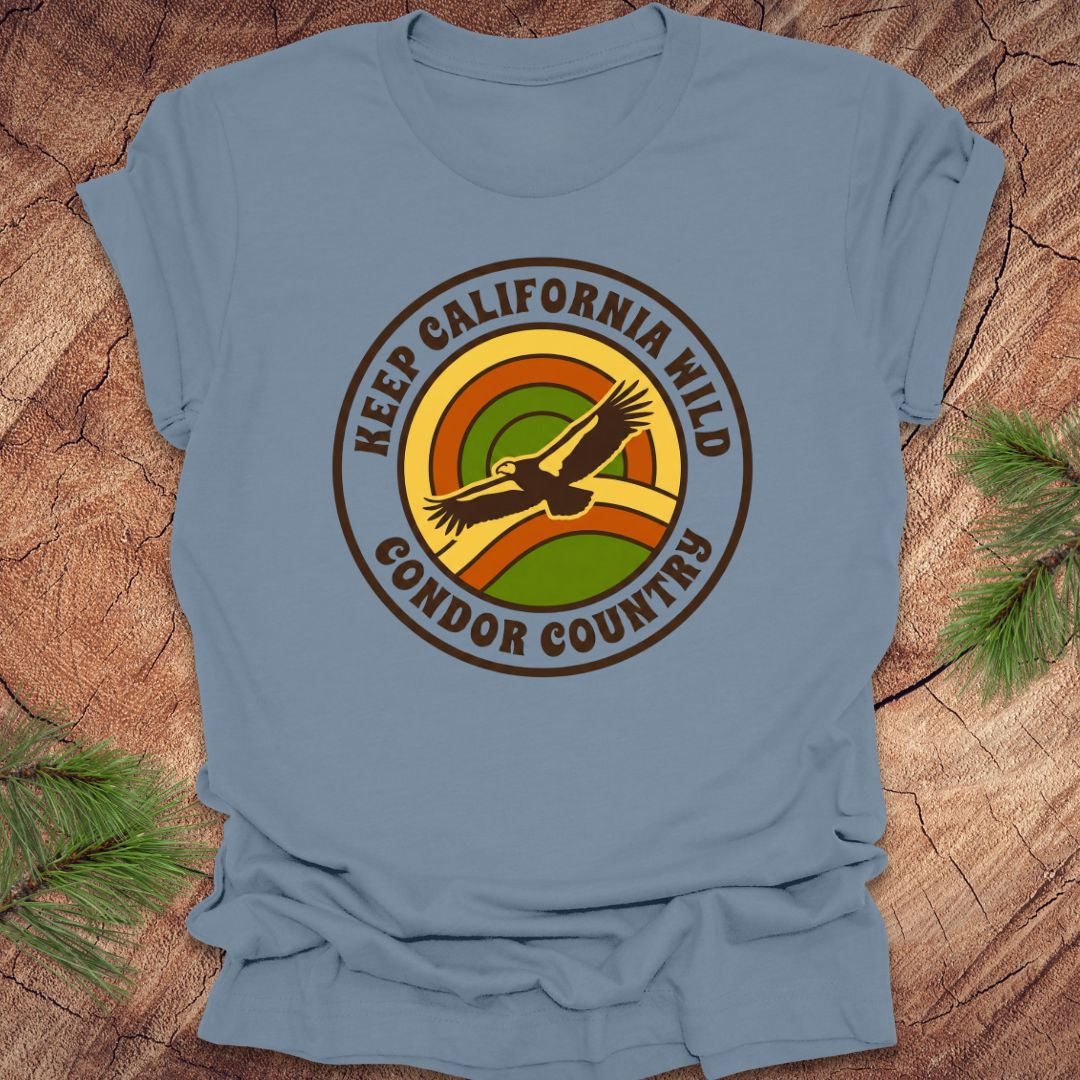 Steel blue t-shirt with 'Keep California Wild Condor Country' graphic on a wooden surface.