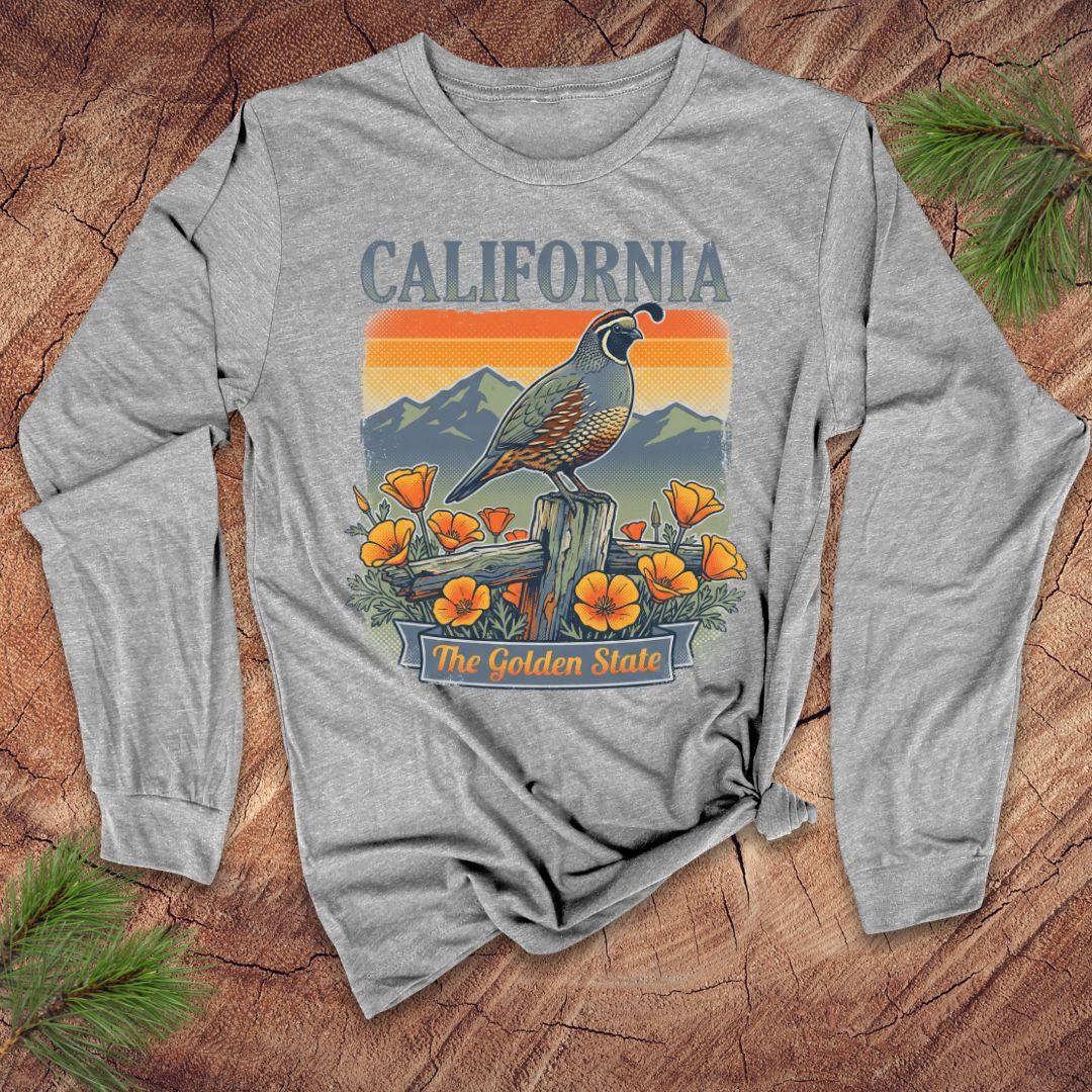 Gray long-sleeve shirt with California quail and poppy design on a wooden surface.