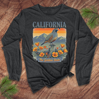 Dark long-sleeve shirt with a California-quail and poppy graphic on a wooden surface.