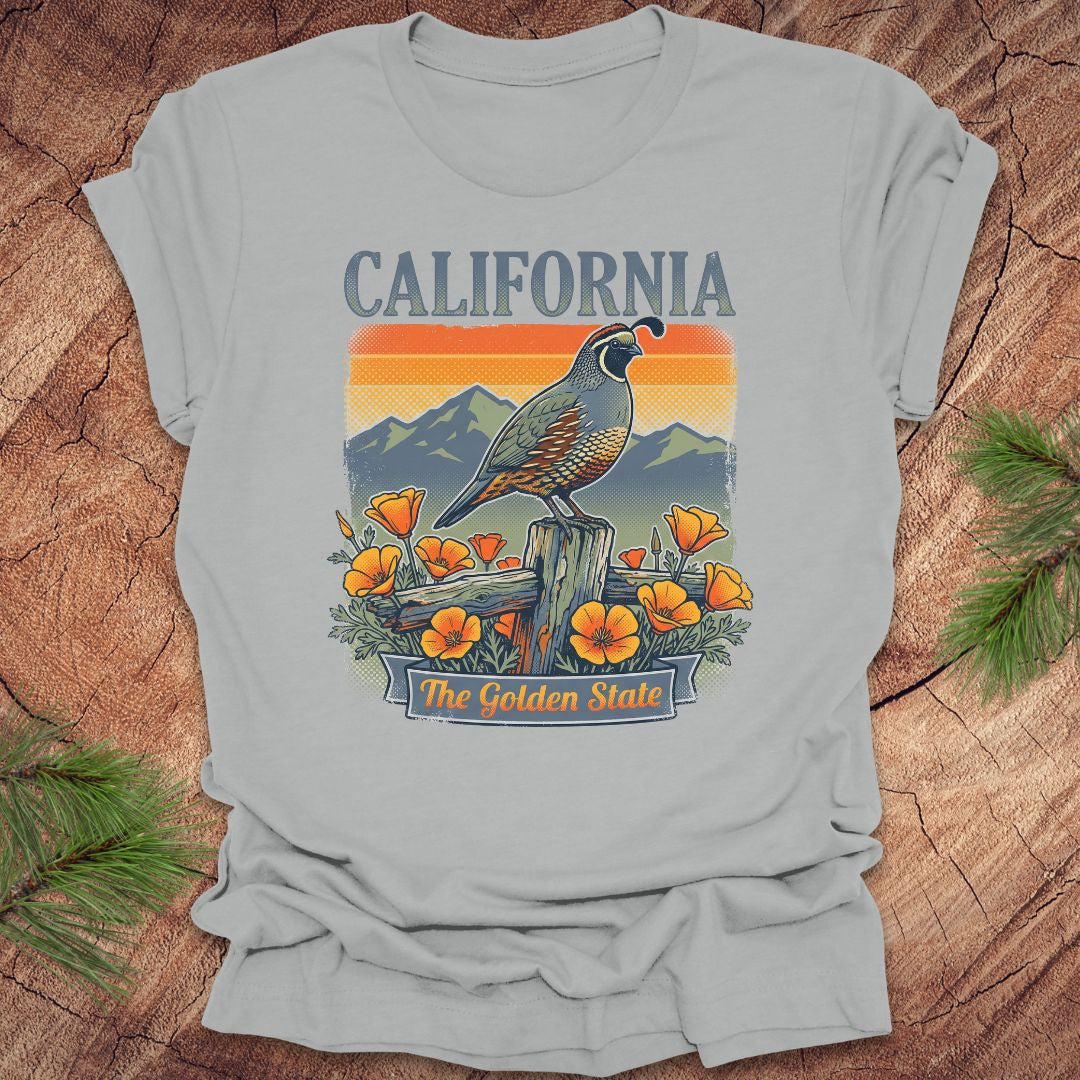 Gray t-shirt with California-themed graphic featuring a quail and poppies on a wooden surface.