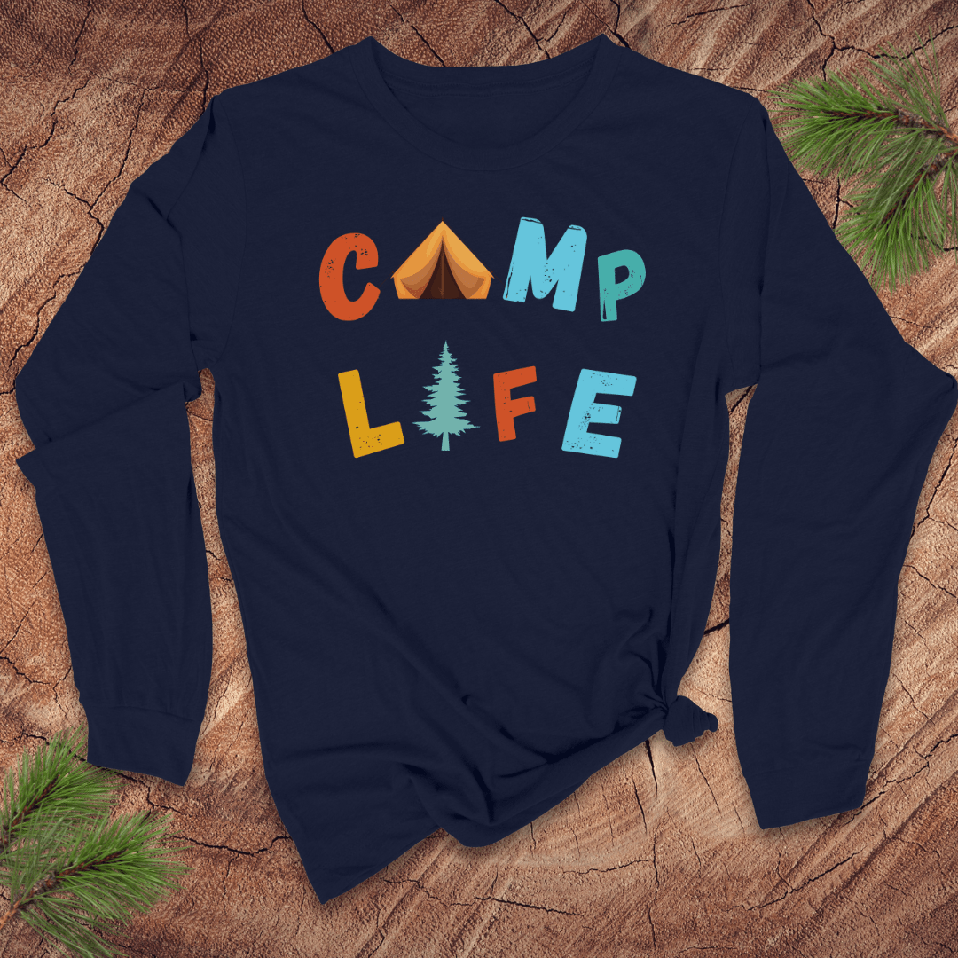 Navy blue long sleeve tshirt with 'CAMP LIFE' text and camping-themed graphics on a wooden surface.
