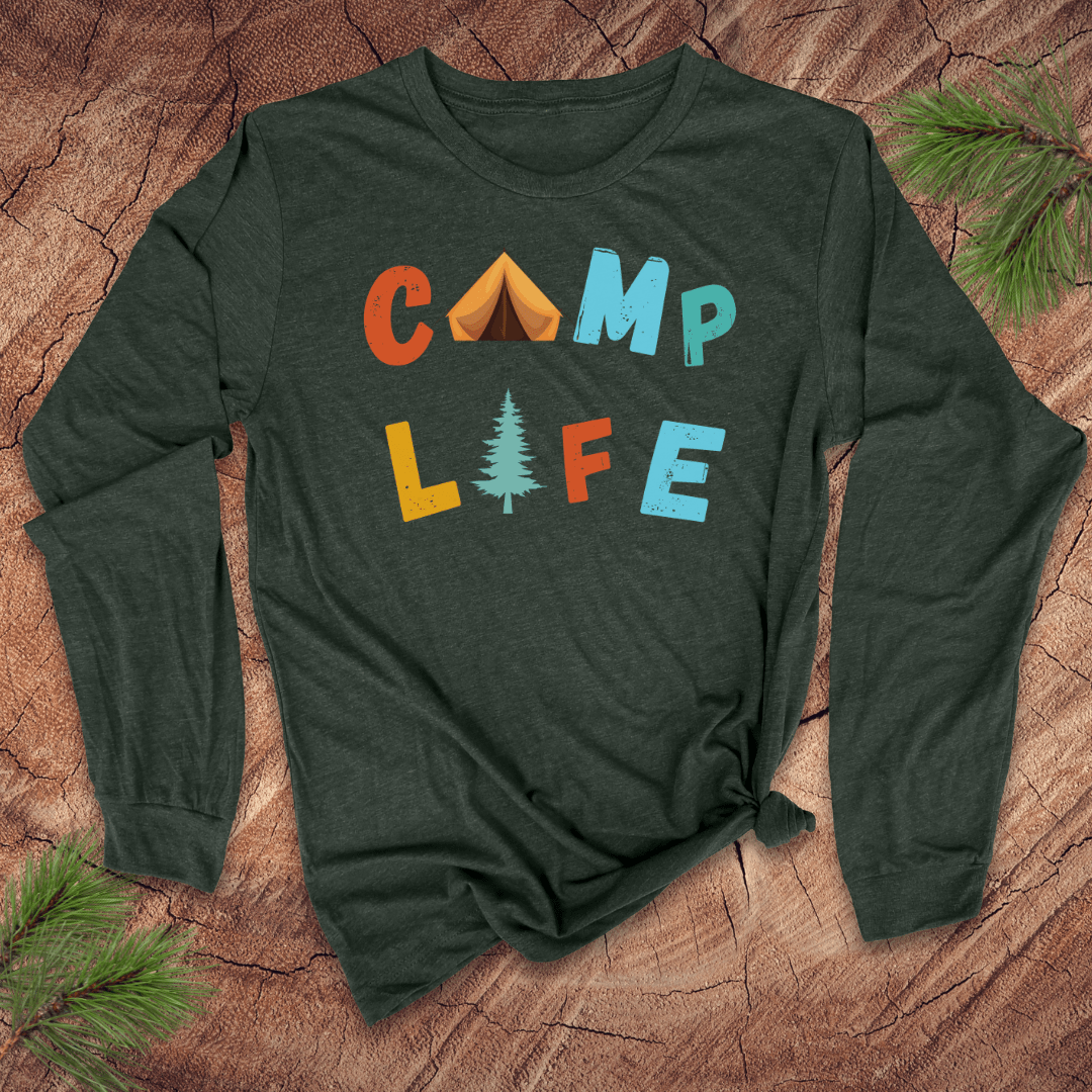 Green long-sleeve shirt with 'CAMP LIFE' text and camping-themed graphics on a wooden surface.
