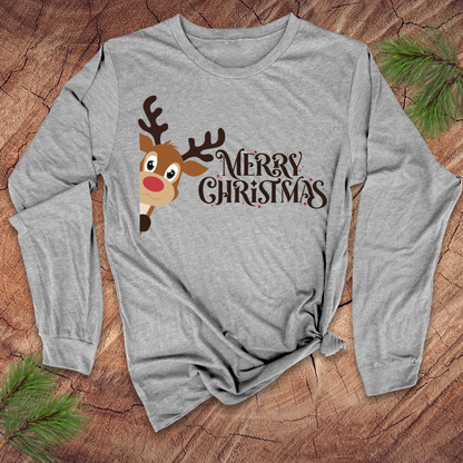 Gray long-sleeve shirt with a reindeer and 'Merry Christmas' text on a wooden surface.