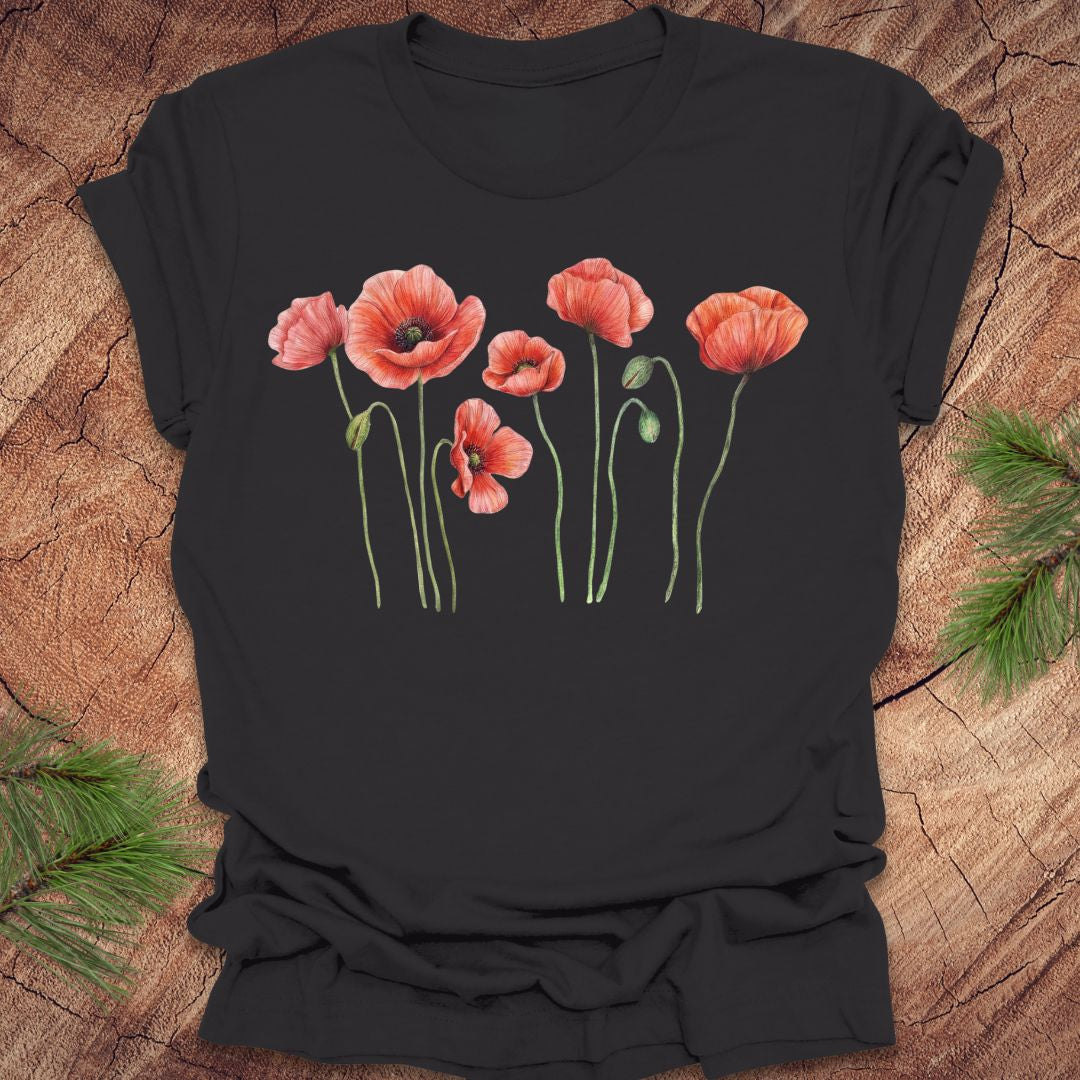Dark gray t-shirt with red poppy flower design on a wooden surface